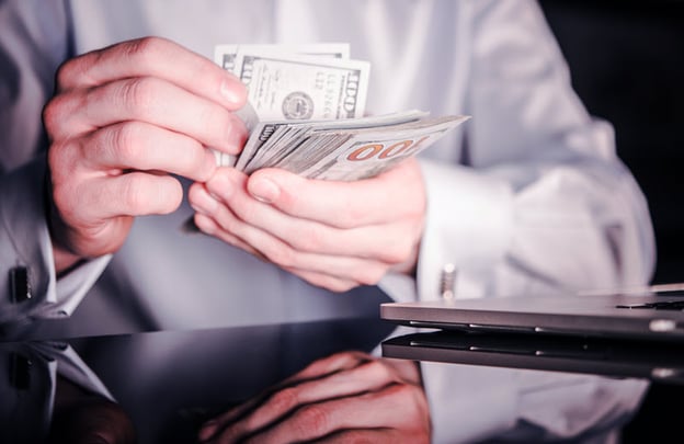 banker-counting-cash-money