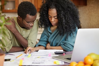 couple-reviewing-their-finances-analyzing