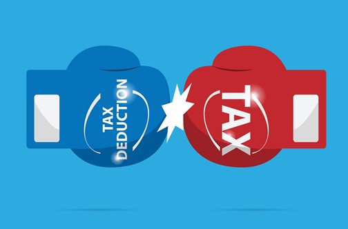 blue tax deduction boxing glove hitting red tax boxing glove 